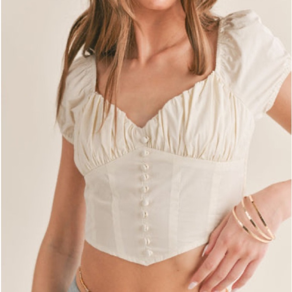 Super cute vintage-inspired sage green top with short sleeves & button-up front.